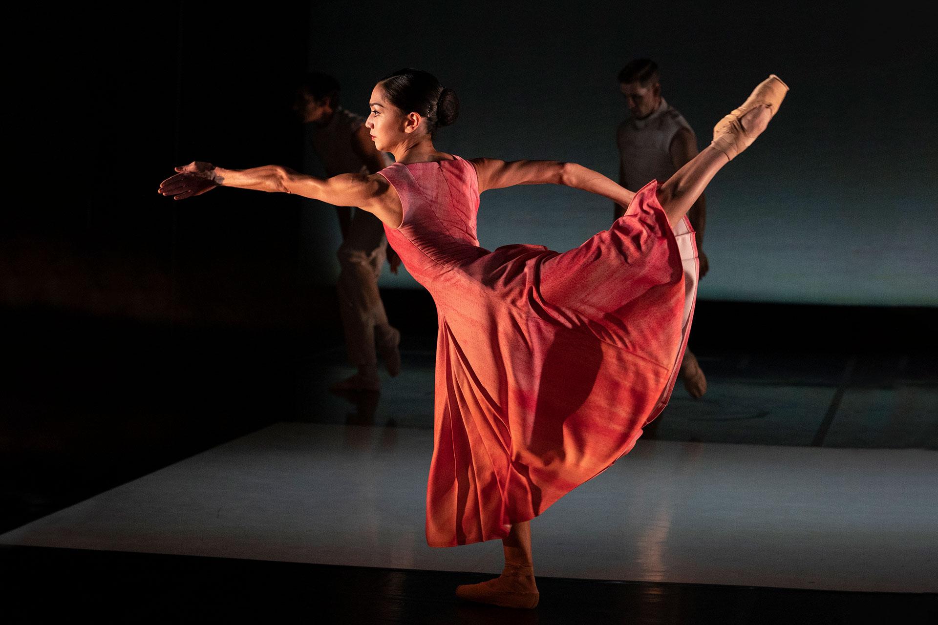 Rachael Gillespie lifts her leg in a high arabesque with an arm outstretched