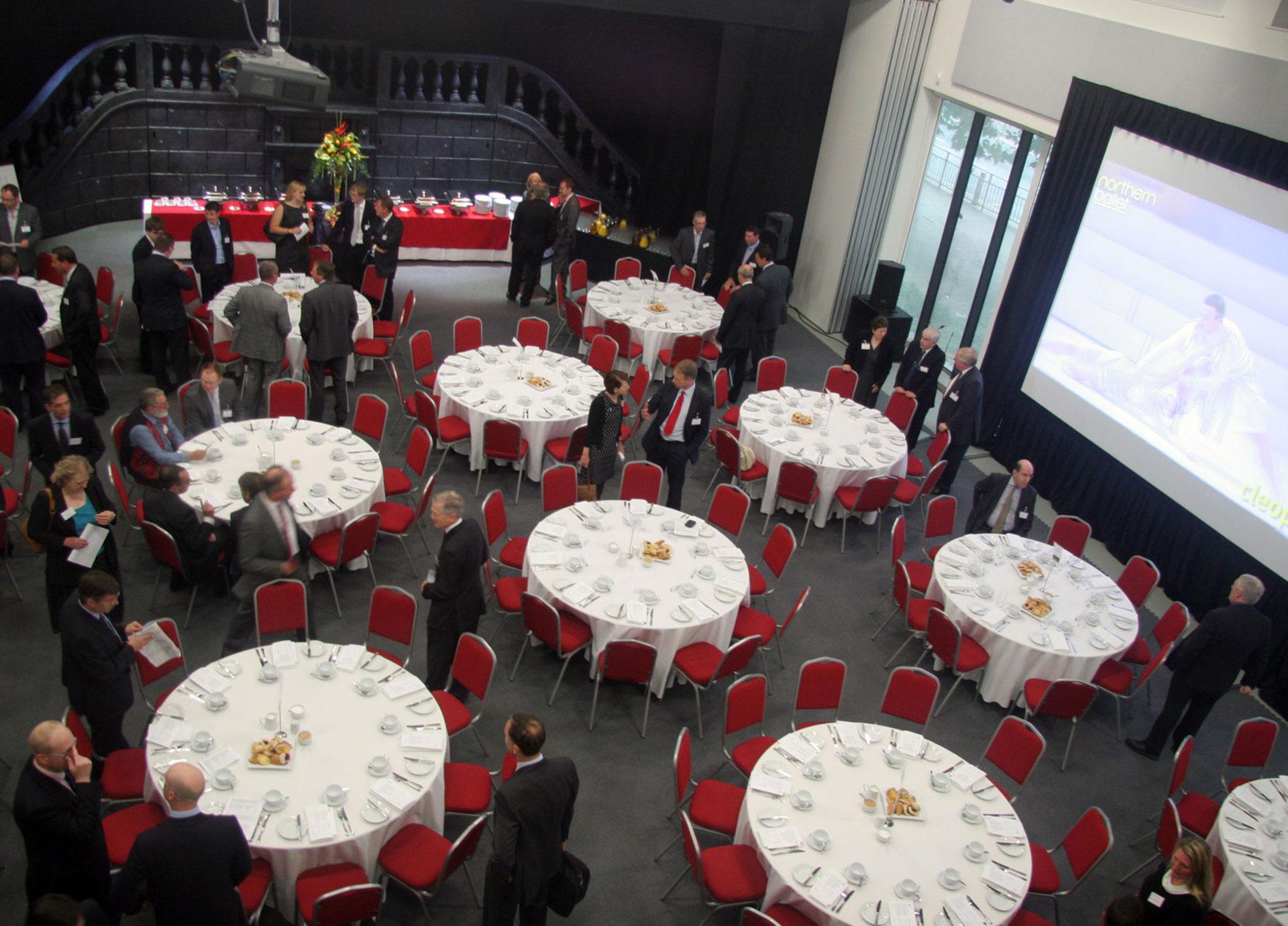 A studio full of round tables