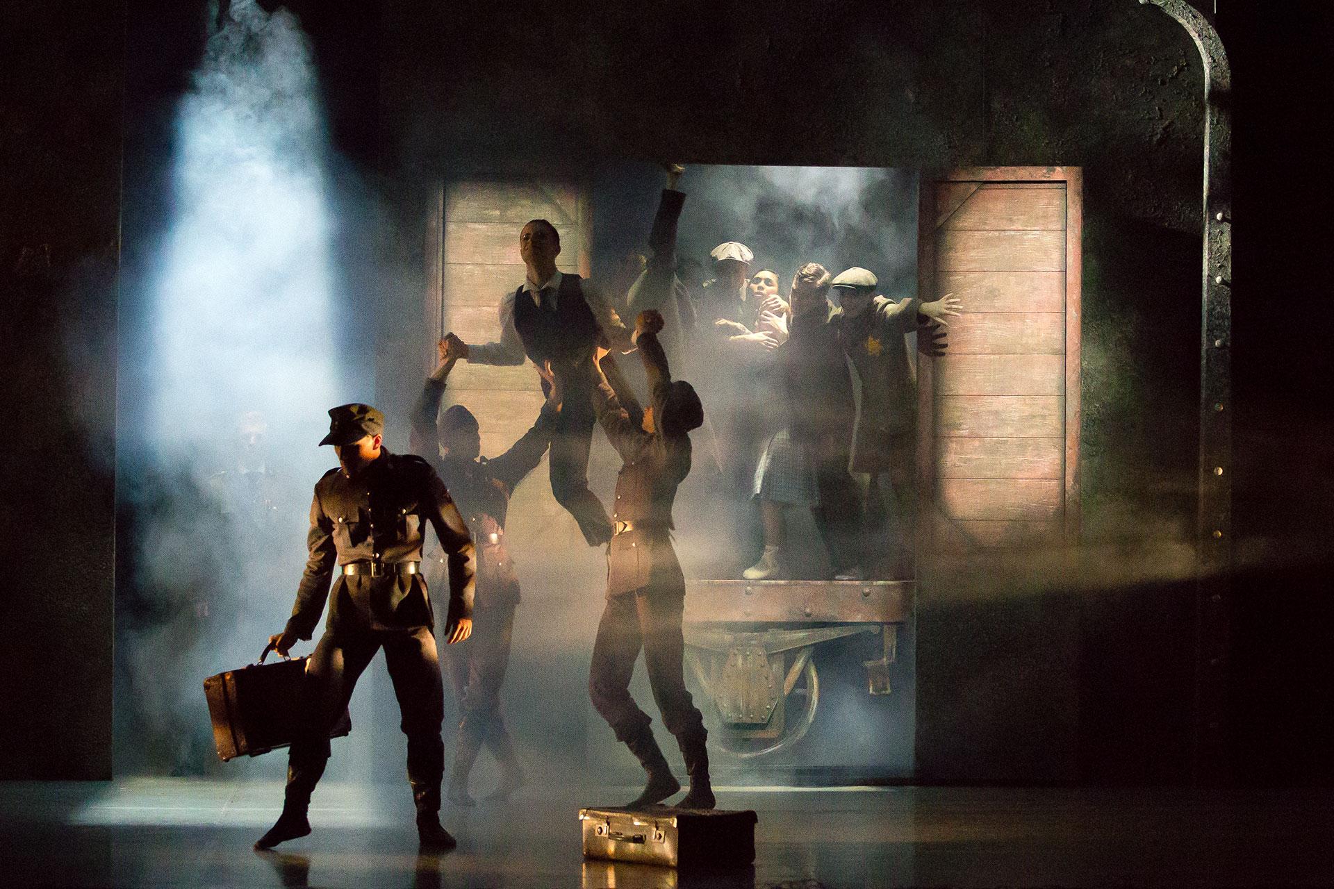 Nazi soldiers drag good people off a train