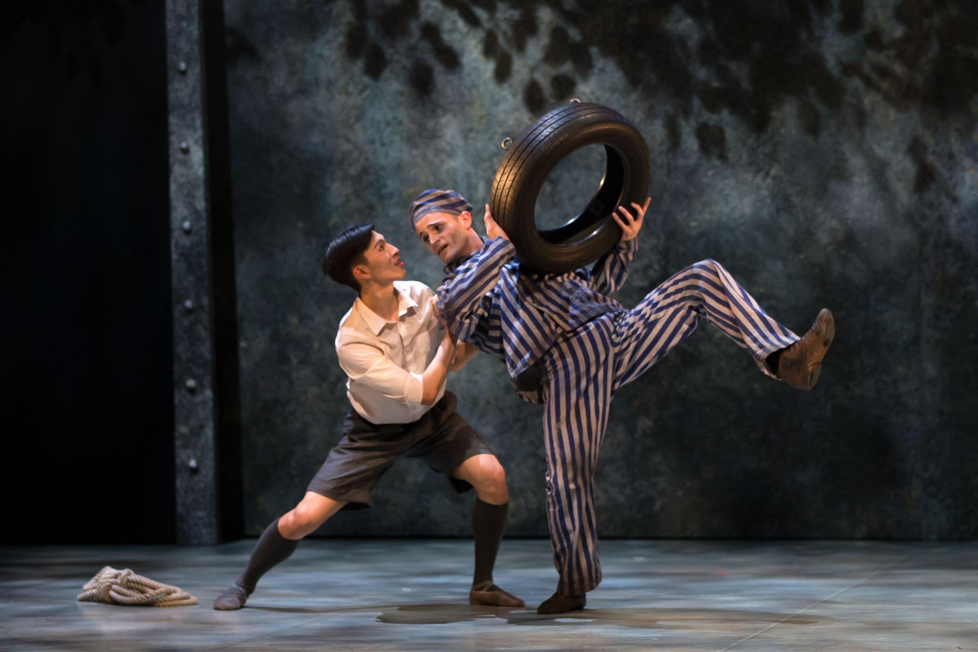 Exhausted, Pavel nearly falls but Bruno catches and helps him