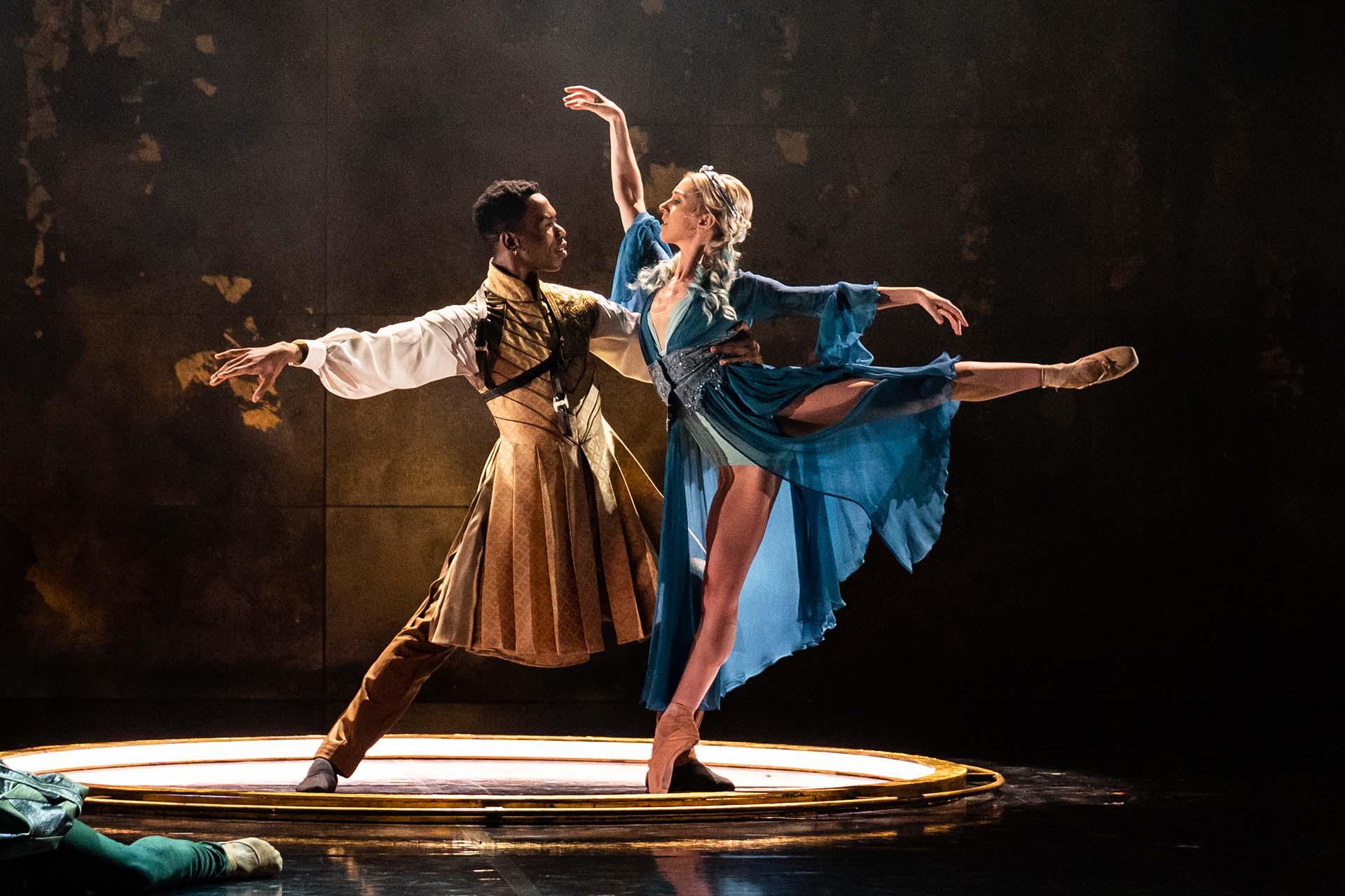 Uther holds Ygraine as she is in arabesque