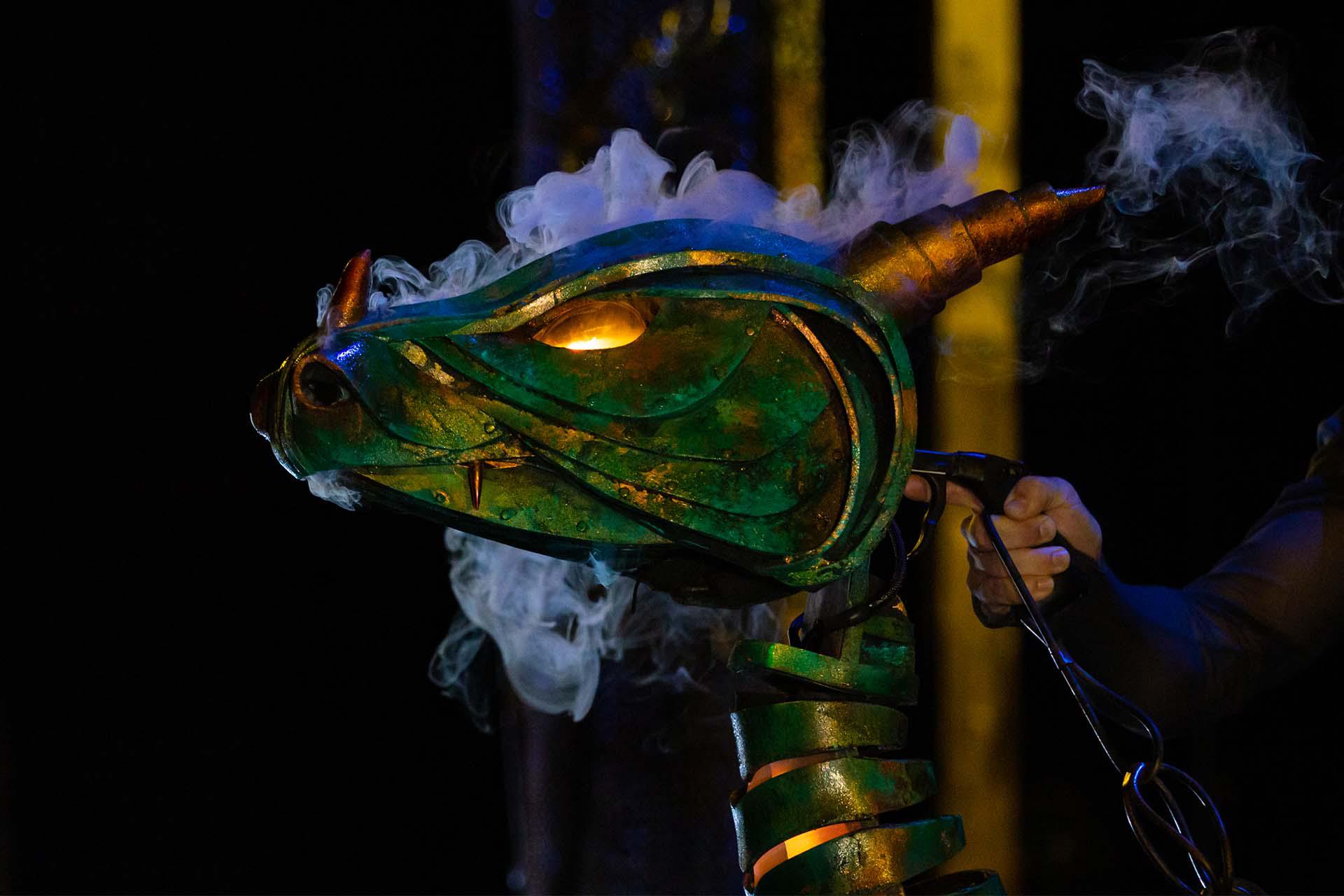 The Dragon, eyes glowing and smoke pouring from its mouth