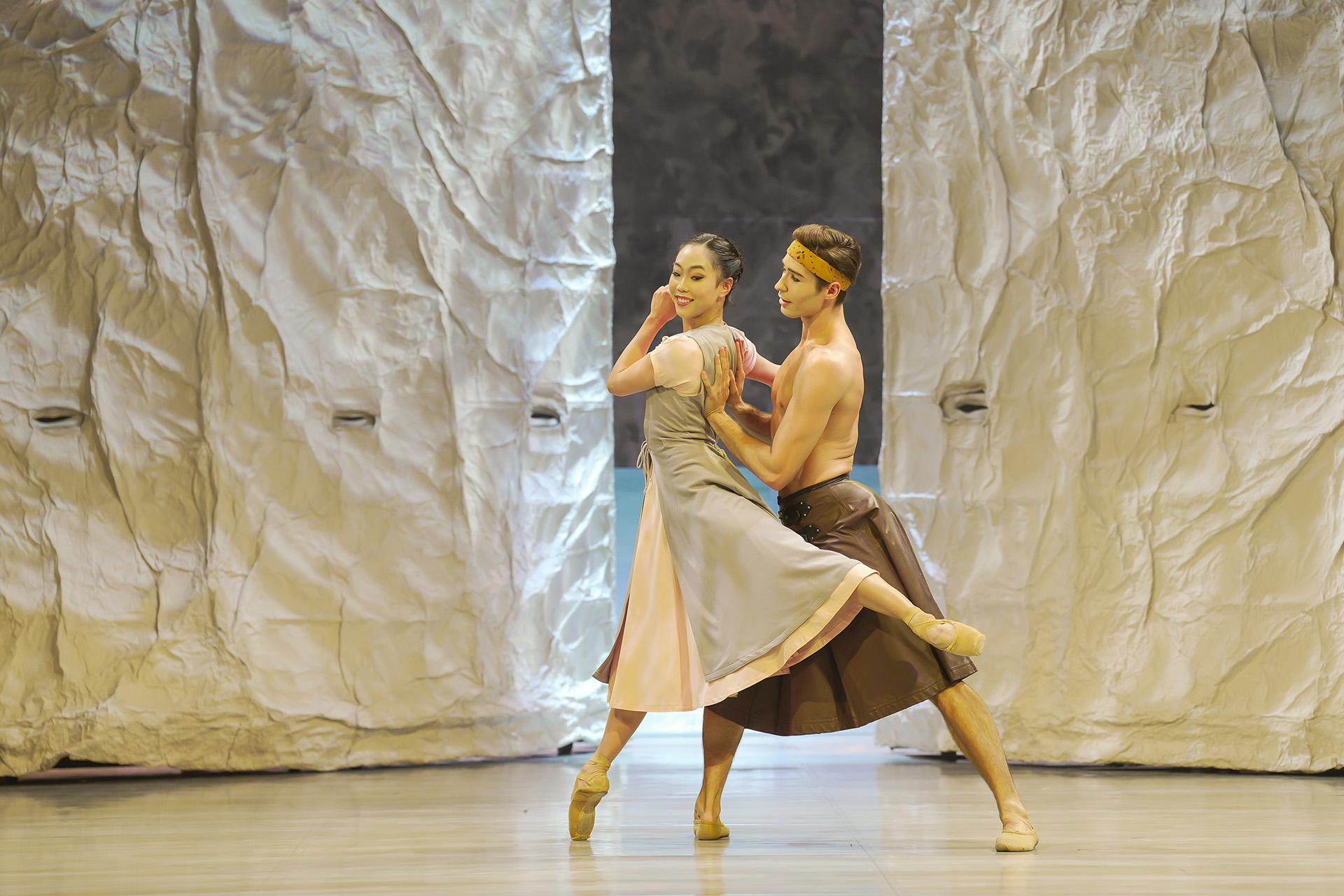 Dana and Prince Adair dance, Dana looking coquettishly over her shoulder at Prince Adair