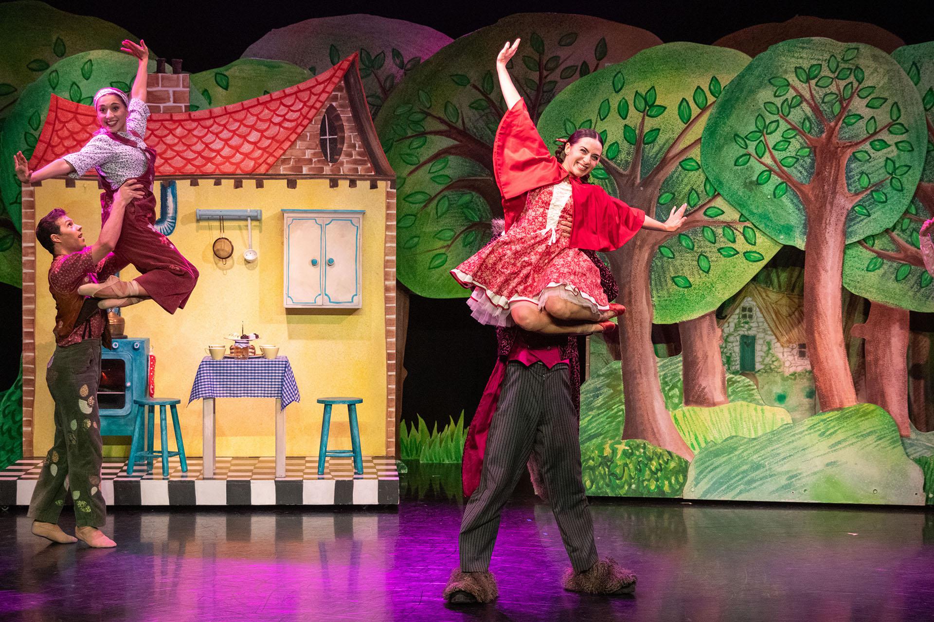 Father lifts mother and the Wolf lifts Little Red, all happy and joyous