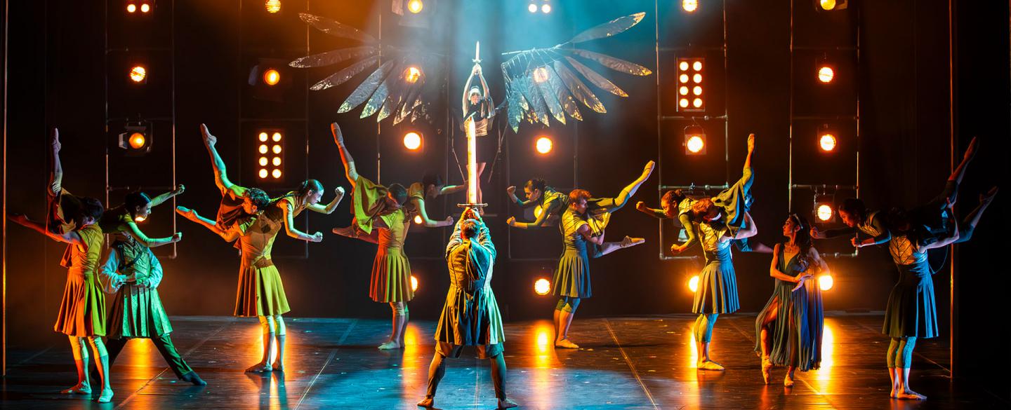 Merlin holds the glowing sword high against Morgan's magicks, Morgan stands, her dark wings spread behind her holding a deadly dagger, between then the Kingdom is at war