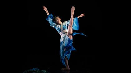 Okichi is conflicted wearing her blue Geisha kimono